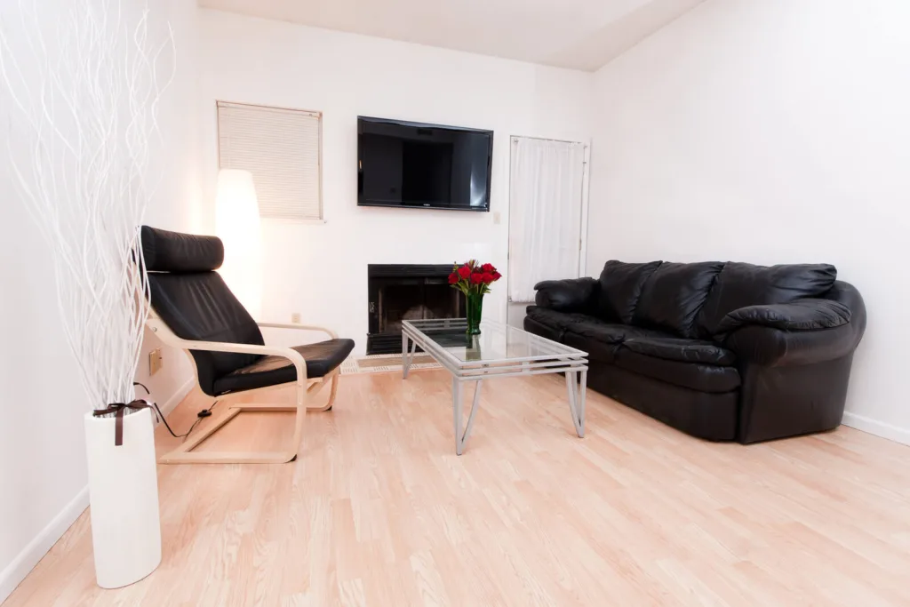 Living room at Campus Oaks Apartments, photo 5 of 8