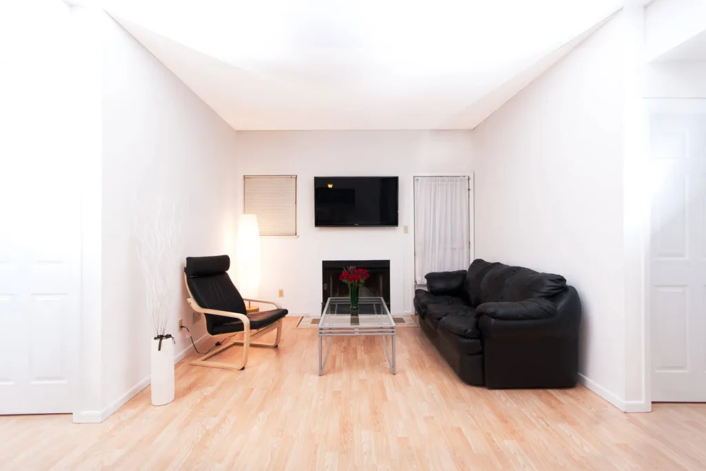 Living room at Campus Oaks Apartments, photo 6 of 8