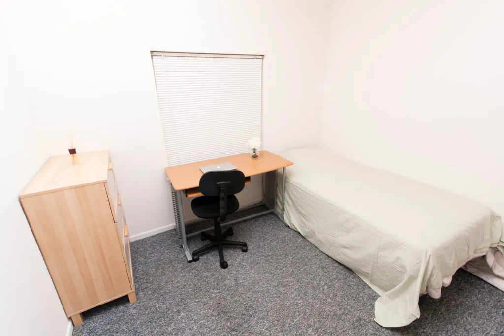 Bedroom at Campus Oaks Apartments, photo 4 of 5